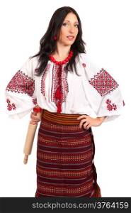 Angry housewife with rolling pin. Woman wears Ukrainian national dress isolated on white background