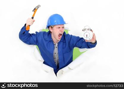 Angry man holding a hammer