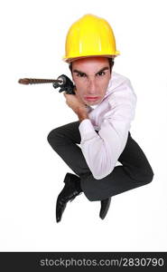 Angry man holding power drill