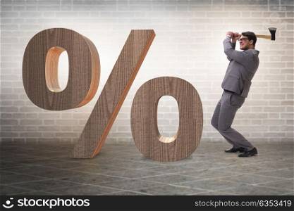 Angry man with axe axing the percentage sign