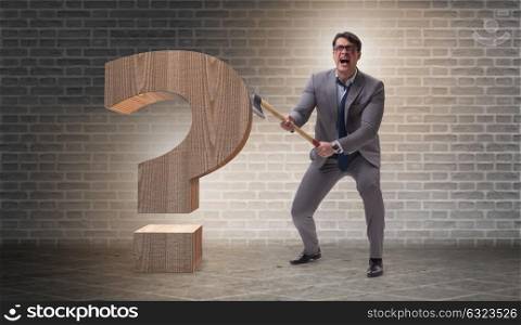 Angry man with axe axing the question mark