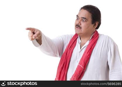 Angry mature politician pointing over white background
