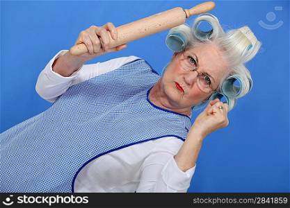 Angry old lady with rolling pin