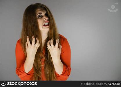Angry pretty attractive woman being pissed off. Very frustrated lady having brown hair.. Angry young pretty woman