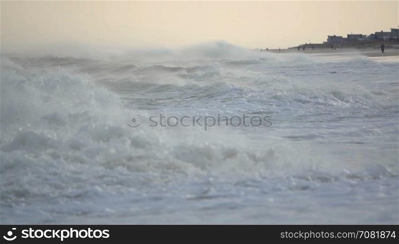 Angry storm surge washes ashore