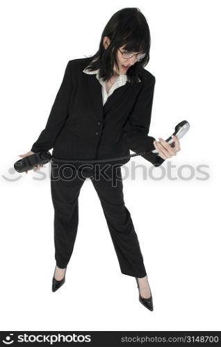 Angry young business woman yelling into phone.
