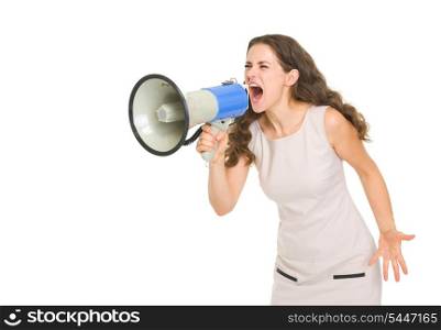Angry young woman shouting thought megaphone