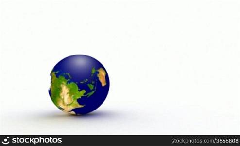 Animated globe falling down and rolling toward the camera