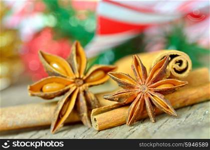 anise and cinnamon for christmas on old wood