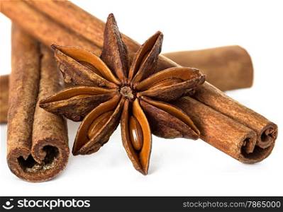 Anise and cinnamon isolated on white background