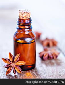 anise oil in bottle and on a table