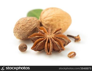 anise star and other spices on white background