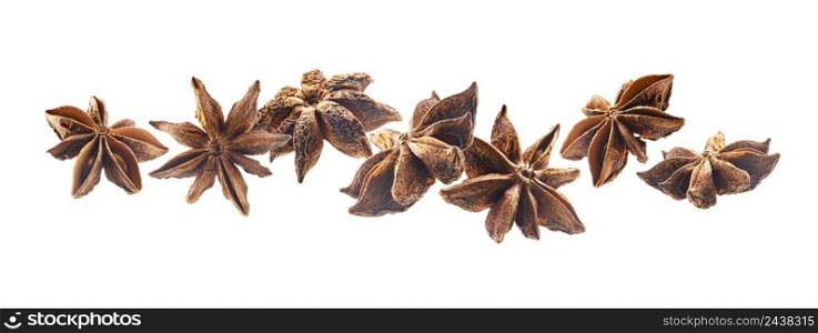 Anise stars levitate on a white background.. Anise stars levitate on a white background