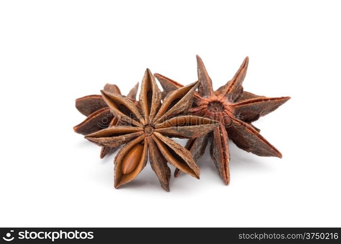 Anise stars on a white background