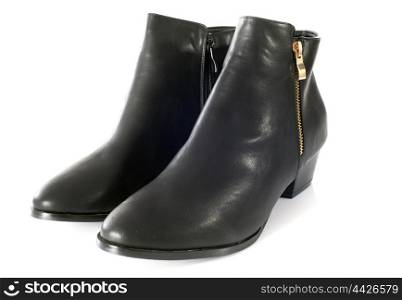 ankle boots in front of white background