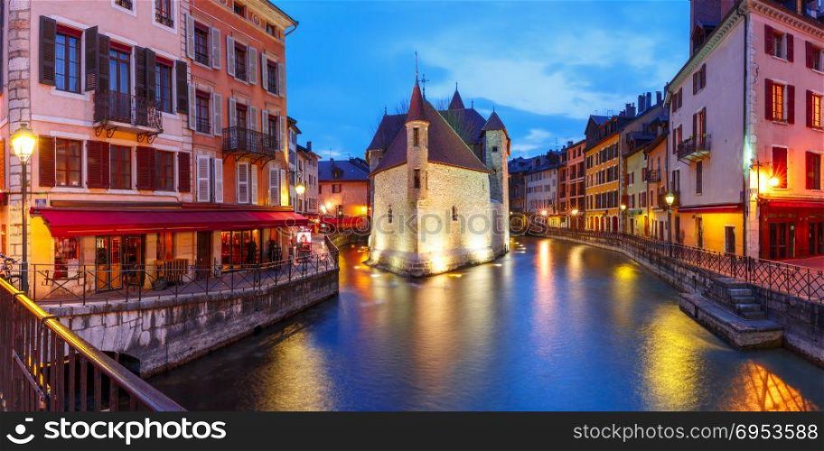 Annecy, called Venice of the Alps, France. Panorama wit the Palais de l&rsquo;Isle and Thiou river during morning blue hour in old city of Annecy, Venice of the Alps, France
