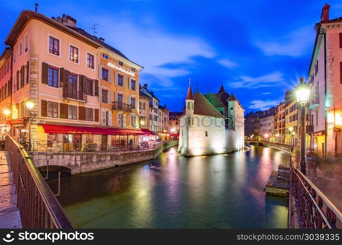 Annecy, called Venice of the Alps, France. The Palais de l&rsquo;Isle and Thiou river during morning blue hour in old city of Annecy, Venice of the Alps, France