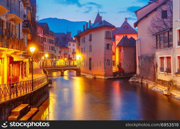 Annecy, called Venice of the Alps, France. The Palais de l&rsquo;Isle and Thiou river during morning blue hour in old city of Annecy, Venice of the Alps, France