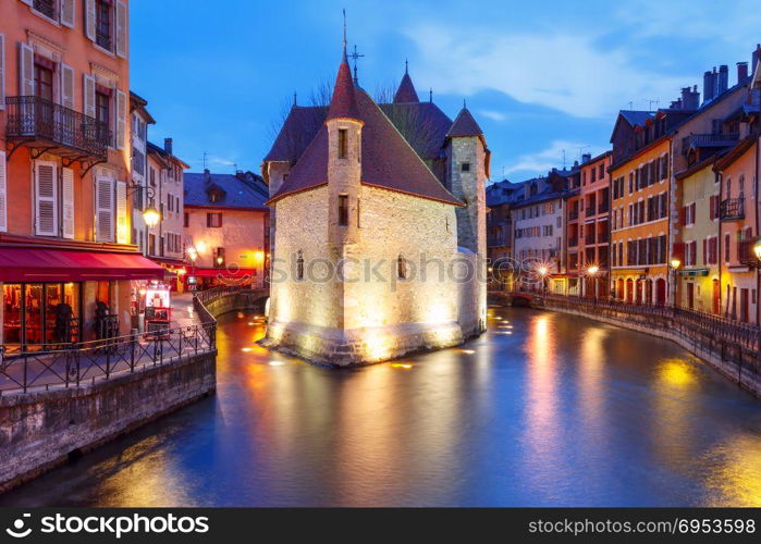 Annecy, called Venice of the Alps, France. The Palais de l&rsquo;Isle and Thiou river during morning blue hour in old city of Annecy, Venice of the Alps, France