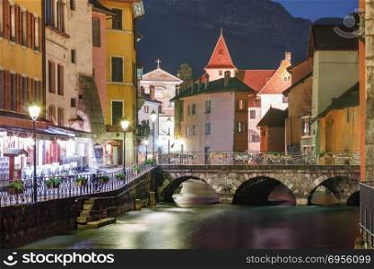 Annecy, called Venice of the Alps, France. The Palais de l&rsquo;Isle and Thiou river during morning blue hour in old city of Annecy, Venice of the Alps, France