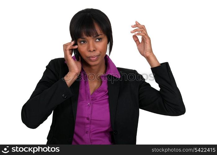 Annoyed businesswoman on the phone