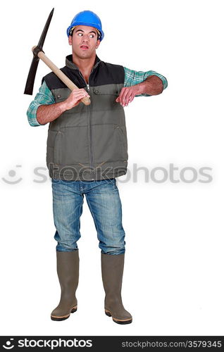 Annoyed man holding axe