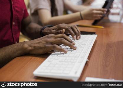 anonymous black man typing