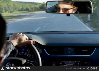 anonymous male traveling with car sunny day