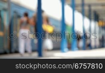 anonymous people go through Railway Station