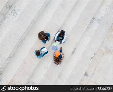 Another day at the university!. Drone Shot : Group multi ethnic young students at the university campus