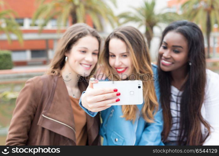 Another day at the university!. Group multi ethnic young students at the university campus