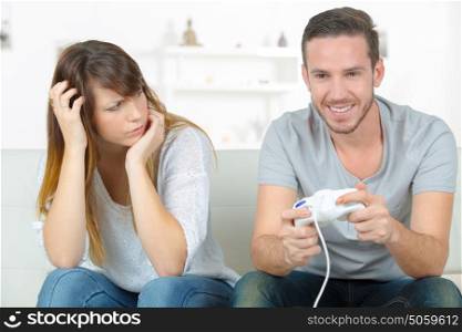 anoyed female because of her gamer boyfriend