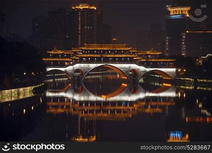 Anshun Bridge and the new development in Chengdu in southwest China. Anshun Bridge