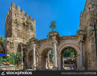 Antalya, Turkey 19.07.2021. Hadrian’s Gate in the old city of Antalya, Turkey, on a sunny summer day. Hadrian’s Gate in Antalya, Turkey