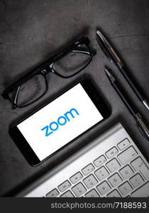 Antalya, TURKEY - March 30, 2020. Smartphone showing Zoom Cloud Meetings app logo.. Zoom Cloud Meetings