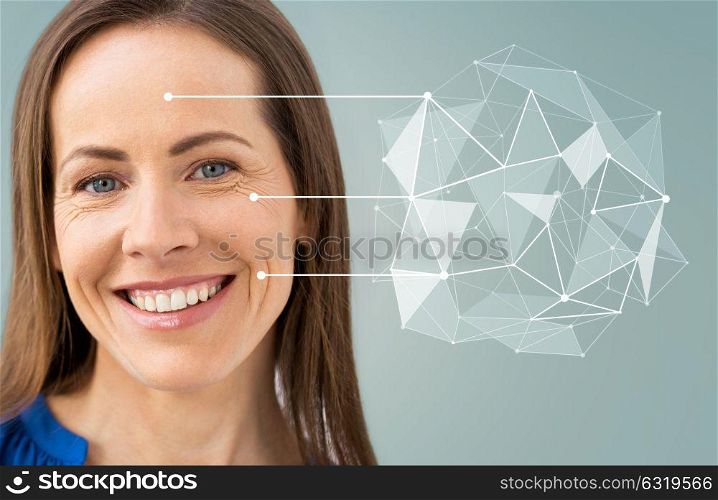 anti-age, people and beauty concept - beautiful middle aged woman with low poly shape and pointers on her face over gray background. middle aged woman with pointers on her face