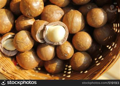 antioxidant fruits, pile of macadamia nuts in basket