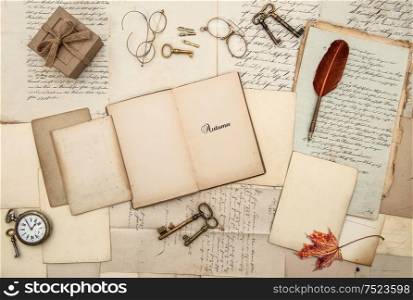 Antique accessories, old letters, gift box, watch and keys. Vintage style autumn background