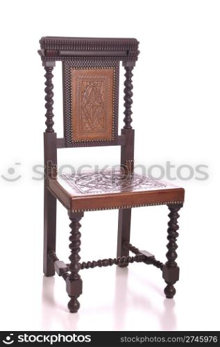 antique black wood chair with leather seat isolated on white background