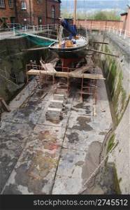 antique boat reparation at dry docks