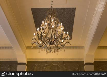 Antique Brilliant Chandelier with Crystal inside Room. Brilliant Chandelier inside Room