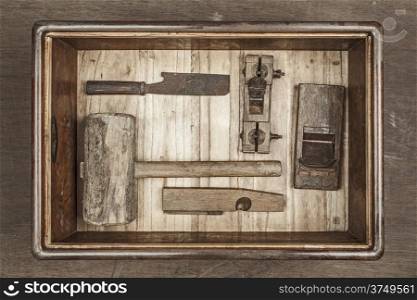 Antique carpenter tool in box set (Still life)