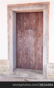 Antique Chinese style door with metal knockers