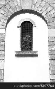 antique contruction in italy europe marble and rose window the wall