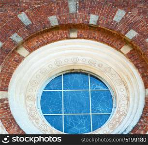 antique contruction in italy europe marble and rose window the wall