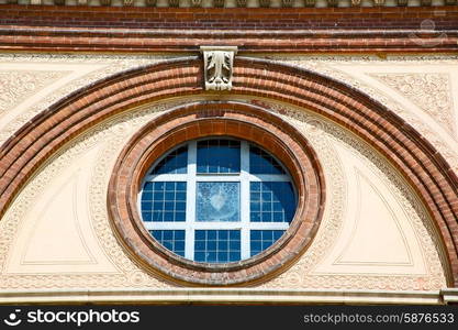 antique contruction in italy europe marble and rose window the wall