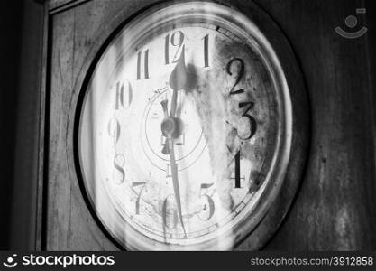 Antique grandfather clock, black and white photo, close up photo