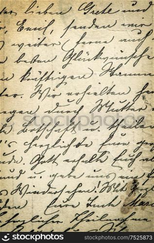 Antique handwriting letter with a text in undefined language. Manuscript. Parchment. Grunge paper background. Vintage style toned picture