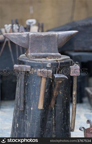 Antique iron anvil in a medieval exhibition