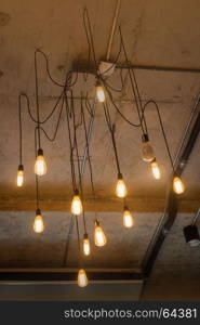 Antique light bulbs hanging on the ceiling, stock photo